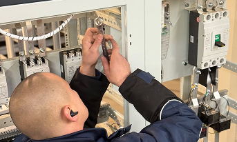the electrician is working