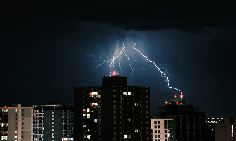 lightning on the background of the night city